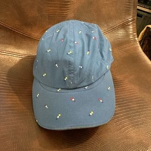 Breathable Blue Lululemon Hat with tiny red, white, yellow, and black squares
